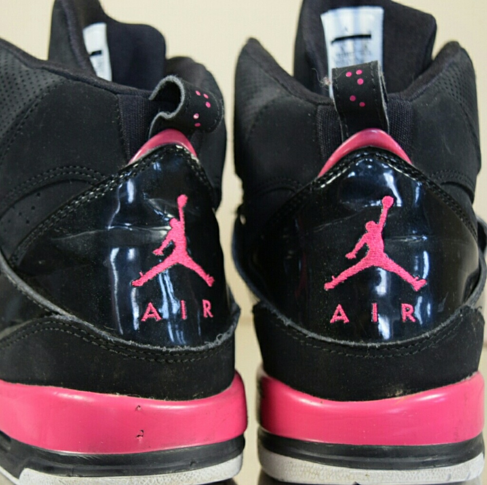 Pink and black Jordan's